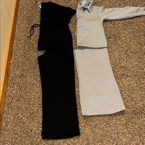 Pair of women’s size small outfits